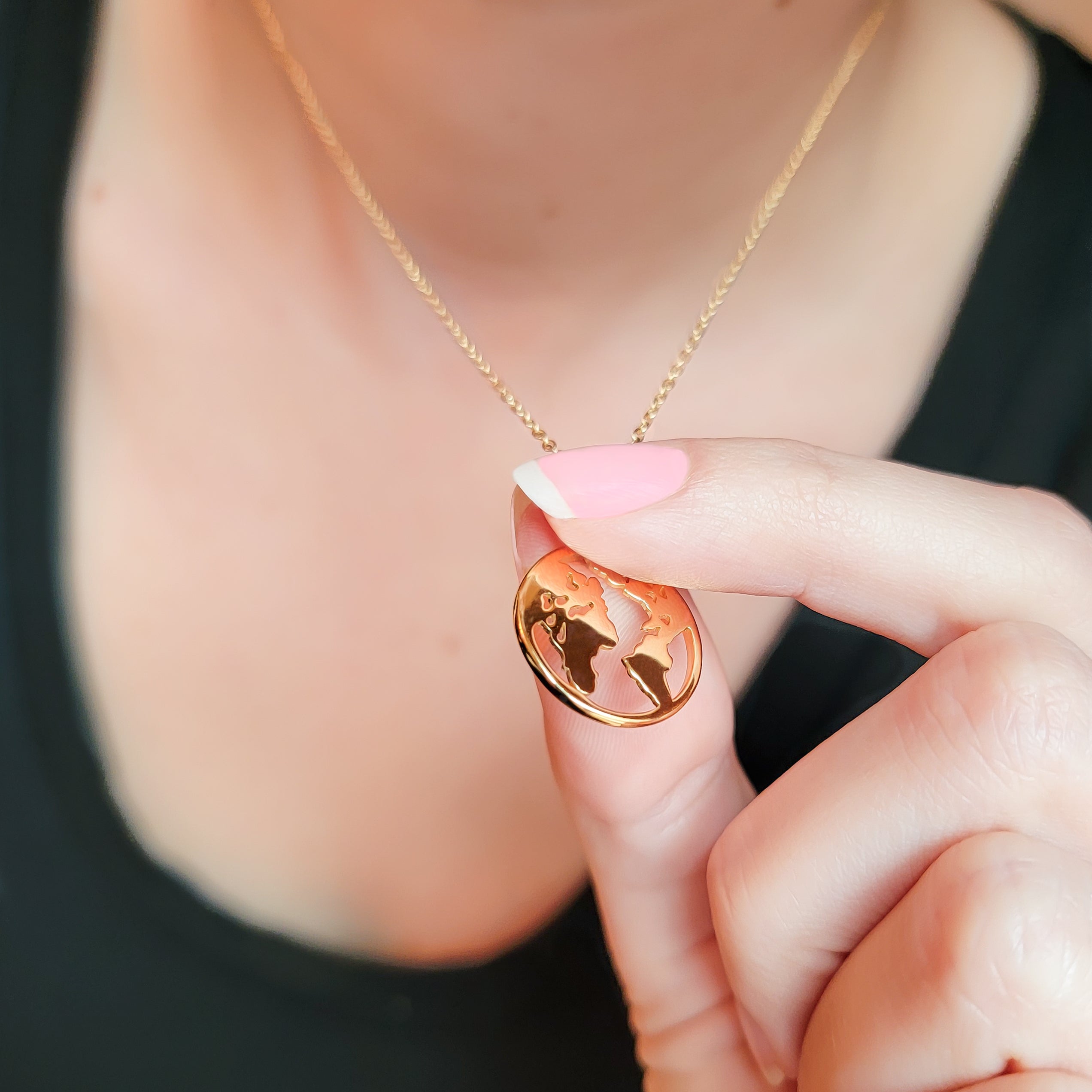 This world map necklace is your dynamic jewelry piece that will be signature to your look. It is elegant, yet casual for everyday wear. This necklace is the simplistic symbol of the traveler at heart and an invitation for conversation. Metal: 925 Sterling Silver with 18 K Gold plating Length :15.5 inches + 2 inches Nickel & Lead-free & Hypoallergenic