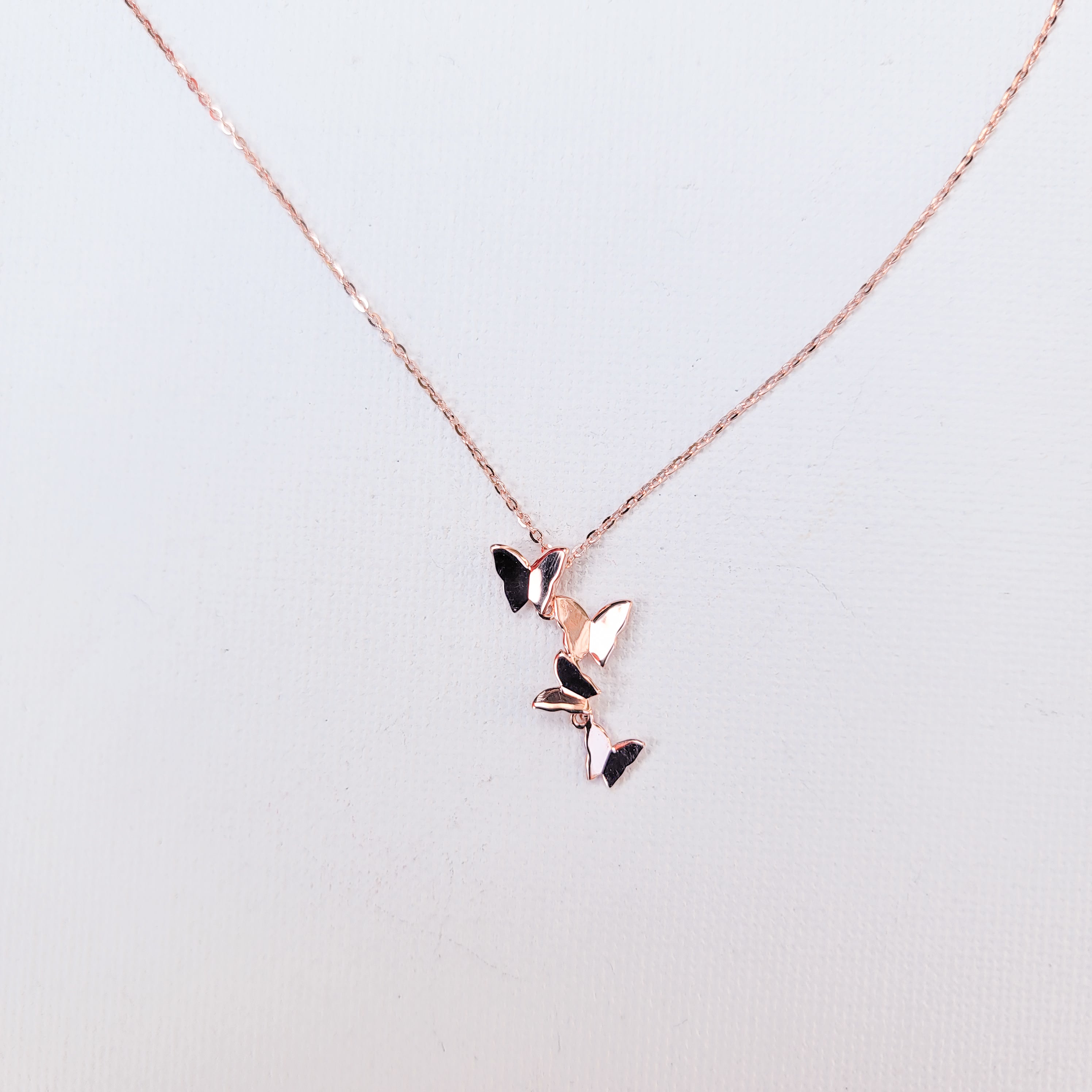 Add elegance and grace to your looks with this charming symbol of new life, letting go of old cycles and finding your true inner expression. Crafted in 925 Sterling Silver and dipped in Rose Gold, this delicate necklace features a group of four graceful butterflies. It’s the perfect gift to yourself or somebody special. Material: Rose Gold plating over 925 Sterling Silver base Necklace length: 16 inch Pendant Shape: four-leaf clover Nickel & Lead-free & Hypoallergenic