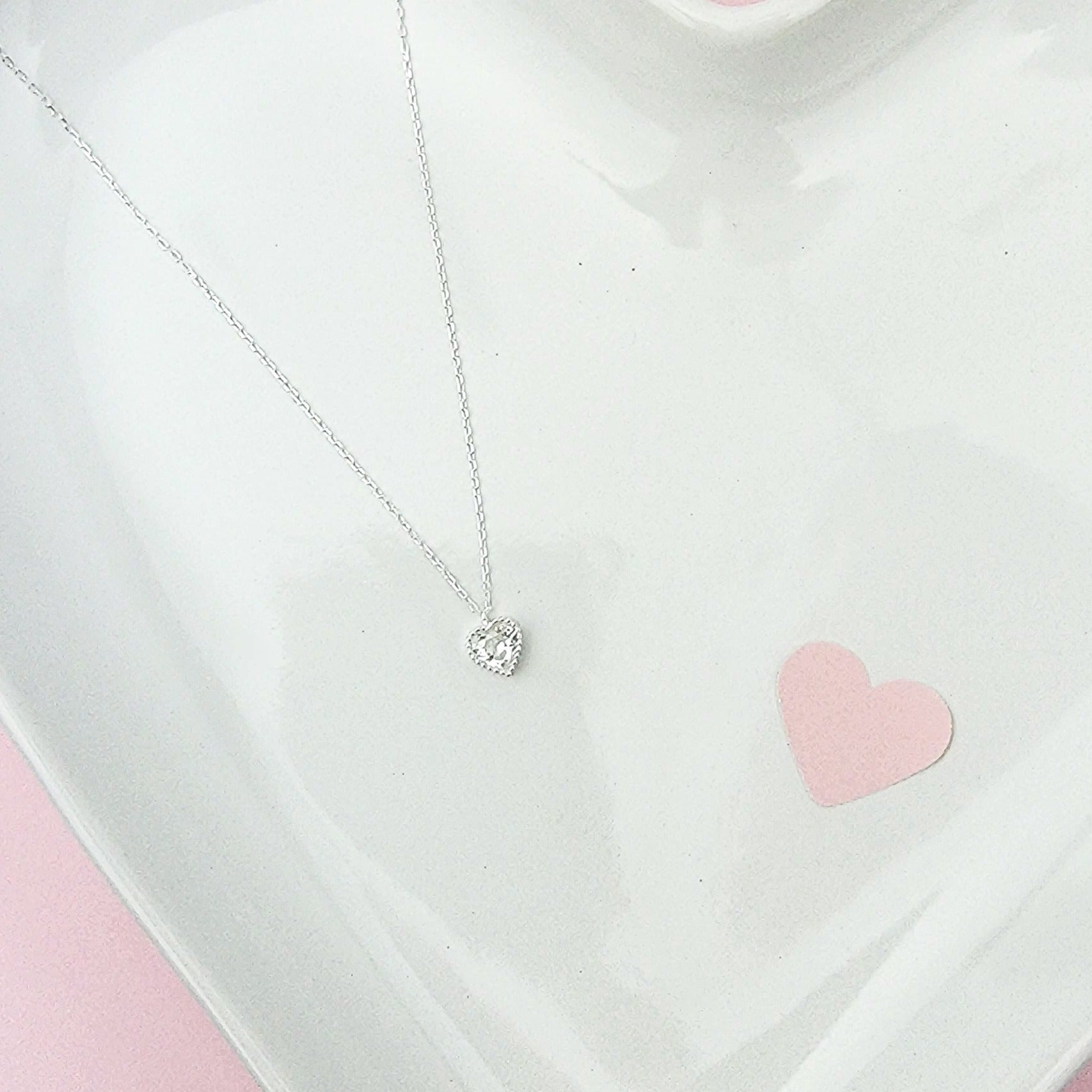 Hot Pink, shimmering White or both? This Brilliant Heart necklace crafted in Sterling Silver and embellished with pink or white heart shaped zirconia stones makes a great statement for any outfit. It's gorgeous and can be worn on daily basis or for special occasions.  Metal: 925 Sterling Silver  Chain Length:16 Inches + 2 inches extension Nickel & Lead free & Hypoallergenic