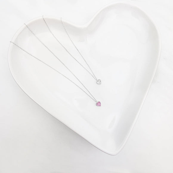 Hot Pink, shimmering White or both? This Brilliant Heart necklace crafted in Sterling Silver and embellished with pink or white heart shaped zirconia stones makes a great statement for any outfit. It's gorgeous and can be worn on daily basis or for special occasions.  Metal: 925 Sterling Silver  Chain Length:16 Inches + 2 inches extension Nickel & Lead free & Hypoallergenic