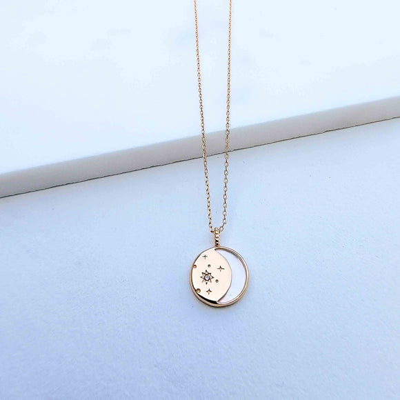  The Moon and Stars Necklace is masterfully crafted in Sterling Silver and plated in Champagne Gold. The pendant featured shell for the outline of the moon representation and cubic zirconia stones to symbolize the stars. What a beautiful piece of jewelry to show appreciation to a love one or celebrate yourself. 
