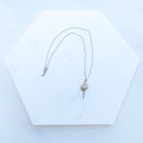 Are you dreaming of the beach? What a stylish way to add some under the sea glamour to your life with this Dazzling Conch Shell Necklace. Featuring a high polished finish for long-lasting shine, the conch shell pendant hangs from a 17-inch chain. Both the pendant and chain are crafted in 925 Sterling Silver and are plated in Gold. Do you prefer white Gold or yellow Gold?  