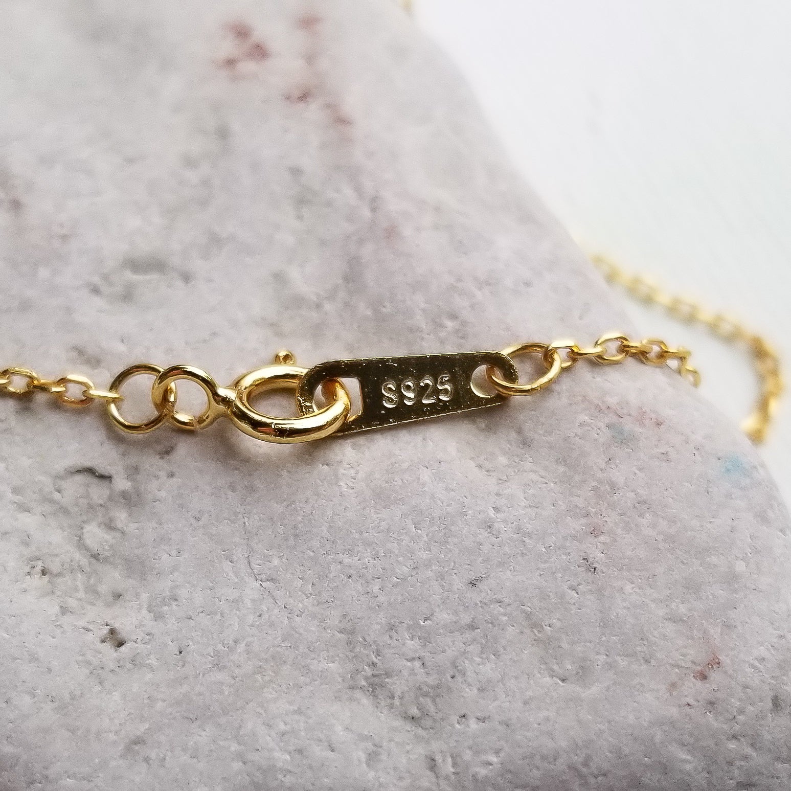 This beautiful choker - lariat style necklace features an elegant bow and a tear cut red zirconia stone. The details really stand out on this necklace. The slender chain and delicate profile make it the ideal everyday piece and it can also be a centerpiece for a special occasion. Material:  14K Gold Plated over 925 Sterling Silver Stone: Red Cubic Zirconia Style: Choker Style Necklace - Bowknot, Tassel Chain Length: 16 Inch Nickel & Lead free & Hypoallergenic