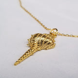Are you dreaming of the beach? What a stylish way to add some under the sea glamour to your life with this Dazzling Conch Shell Necklace. Featuring a high polished finish for long-lasting shine, the conch shell pendant hangs from a 17-inch chain. Both the pendant and chain are crafted in 925 Sterling Silver and are plated in Gold. Do you prefer white Gold or yellow Gold?  